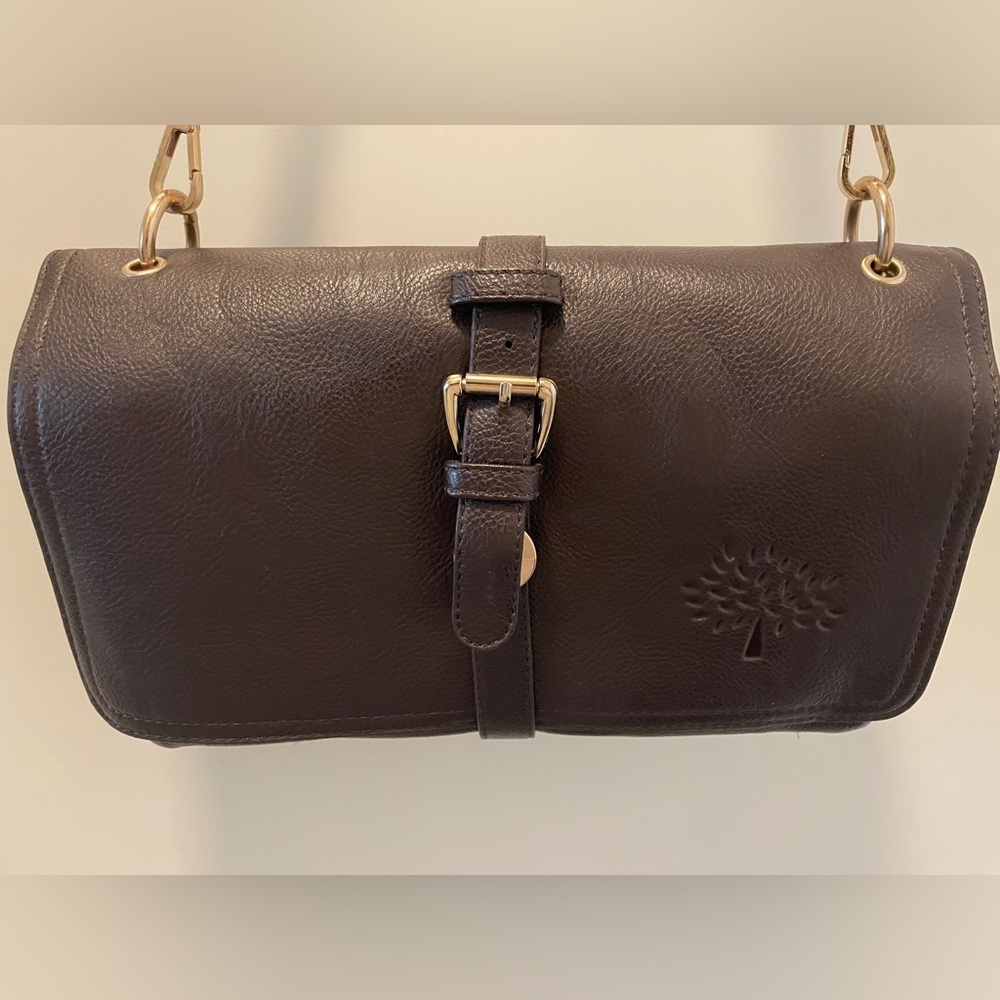 Brown pebble Leather , multi pocketed cross body bag.